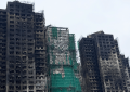 香港大埔宏福苑火灾致168人遇难，首场听证会举行，起火原因初步锁定为烟头：有身穿黄色带有“宏业”等字样T恤的工人抽烟